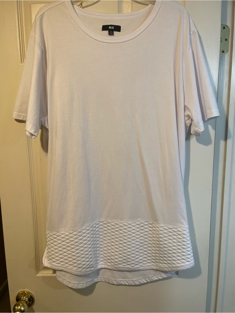 White Quilted Hem Short Sleeve Jersey Top. 33 inches long.